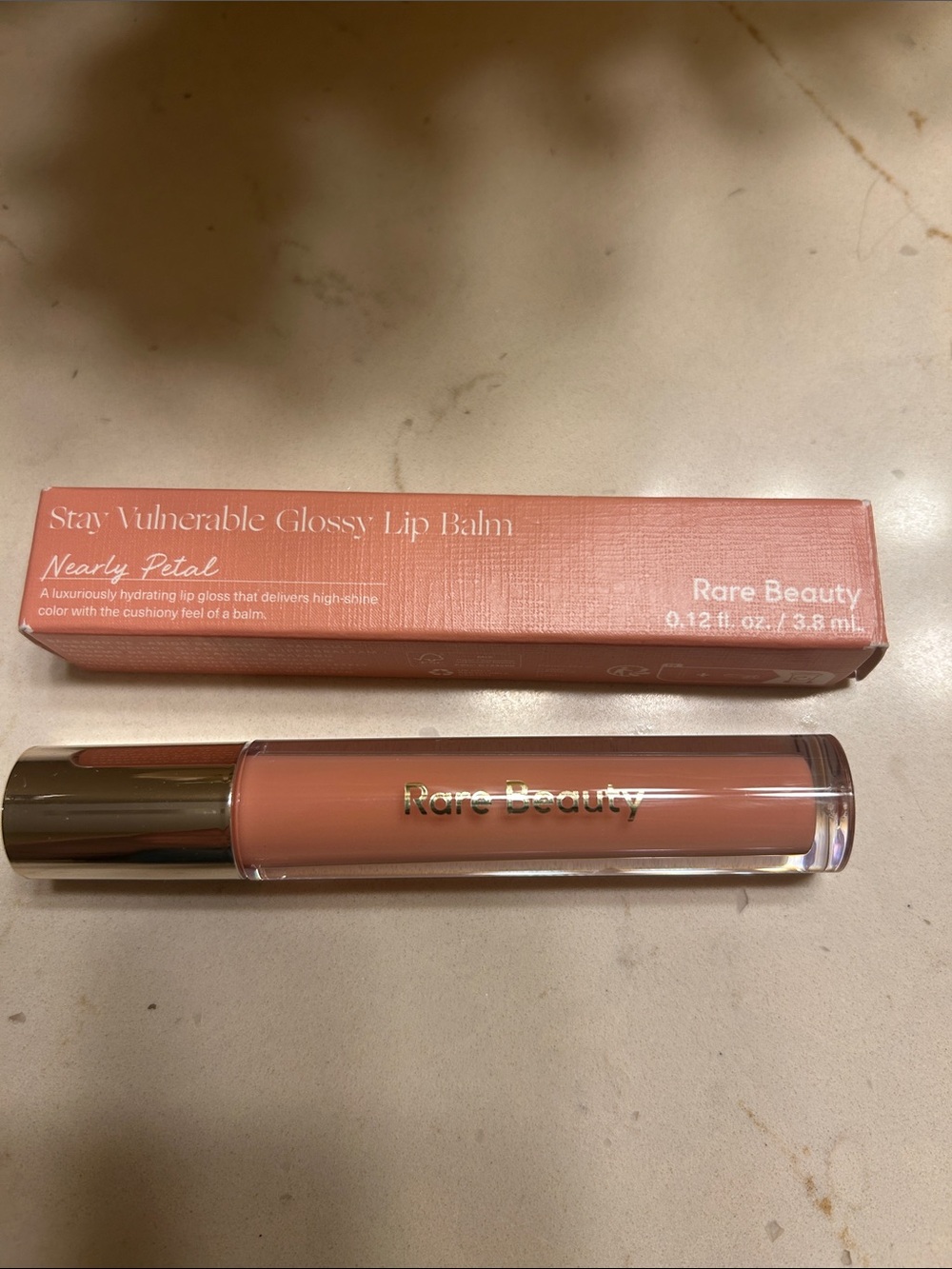 Rare Beauty Stay Vulnerable Glossy Lip Balm - Nearly Petal (Peachy Nude Pink)